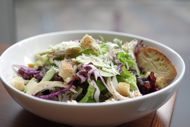 Caesar salad with red cabbage and avocado