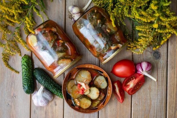 Cucumbers in tomato for the winter