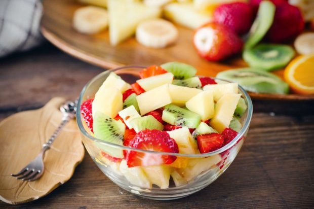 Fruit salad of melon, strawberries and kiwi