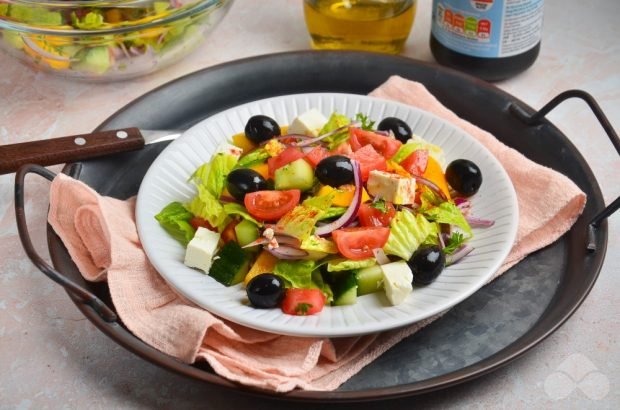 Greek salad with brass and herbs