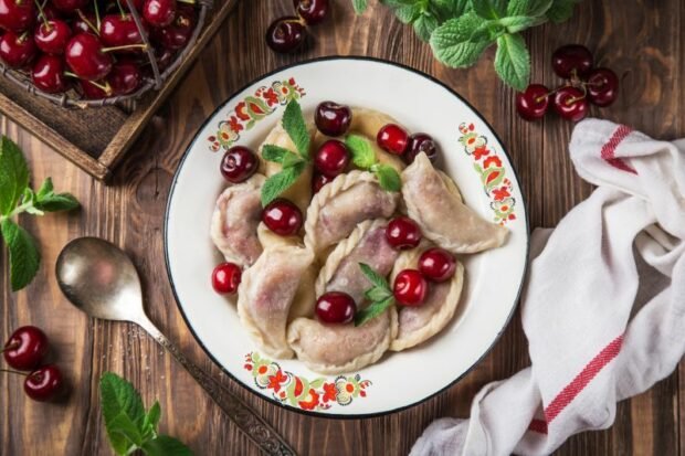 Homemade dumplings with cherries