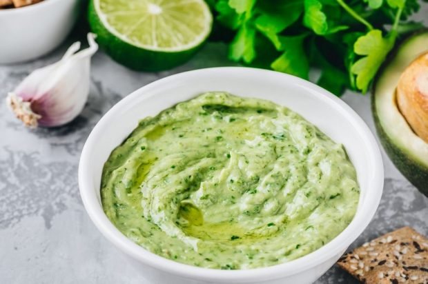 Humus with avocado, greenery and lime juice