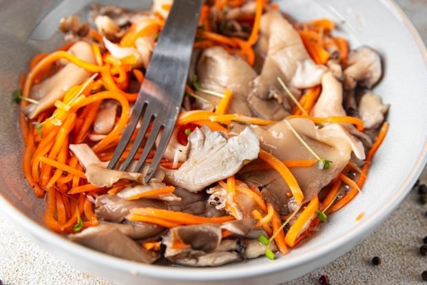 Korean salad with carrots and mushrooms