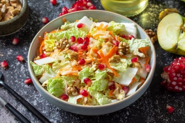 Peking cabbage salad, walnuts and grenade