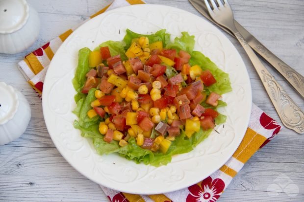 Salad with red fish, corn and vegetables